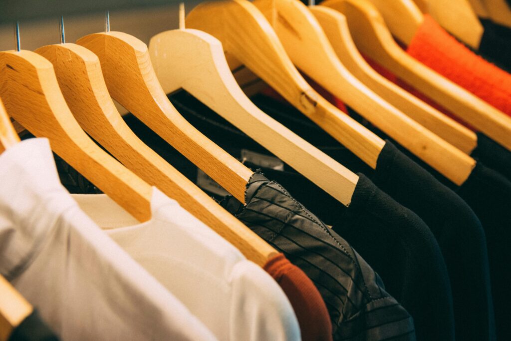 Minimal capsule wardrobe A small, neatly arranged capsule wardrobe