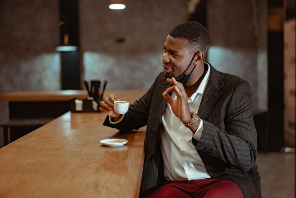 Motivate Yourself by Celebrating Small Wins Person rewarding themselves with coffee after completing a task