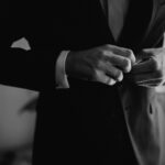 Blog Men adjusting the blazer
