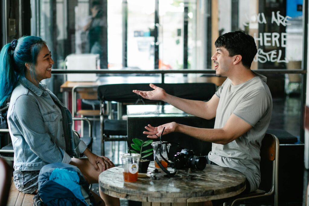 People and presence A candid moment two people sharing coffee, not speaking, just being