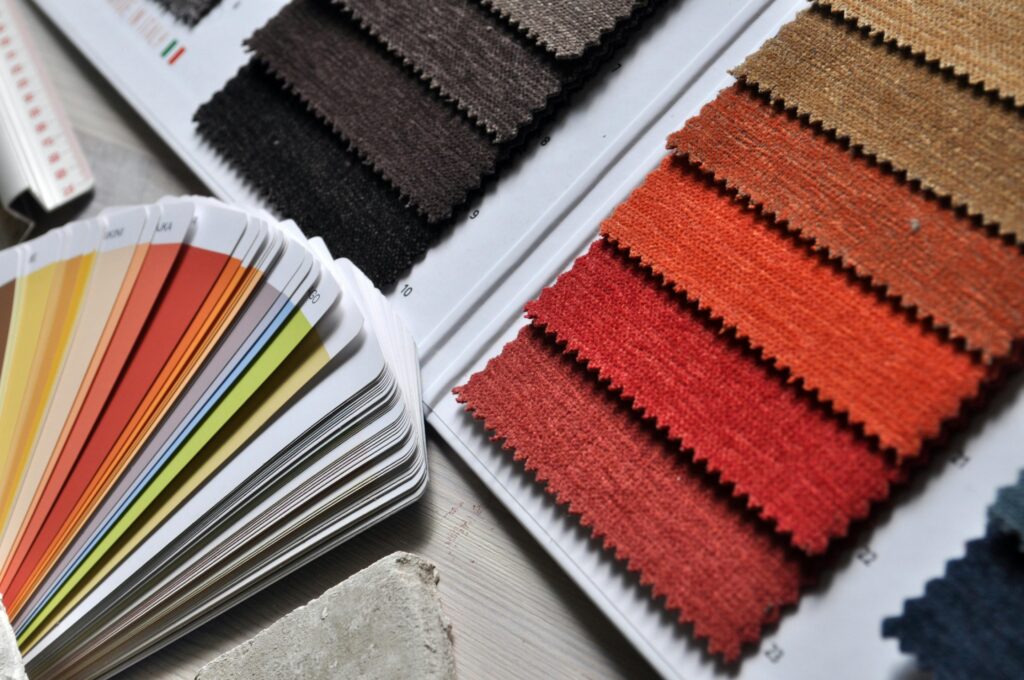 Swatches of color palettes beside coordinated outfit sets. Swatches of color palettes beside coordinated outfit sets.