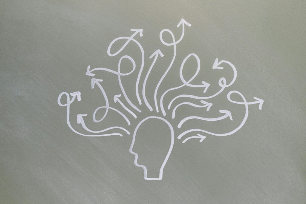 Man deep in thought experiencing rumination and worry—two types of overthinking