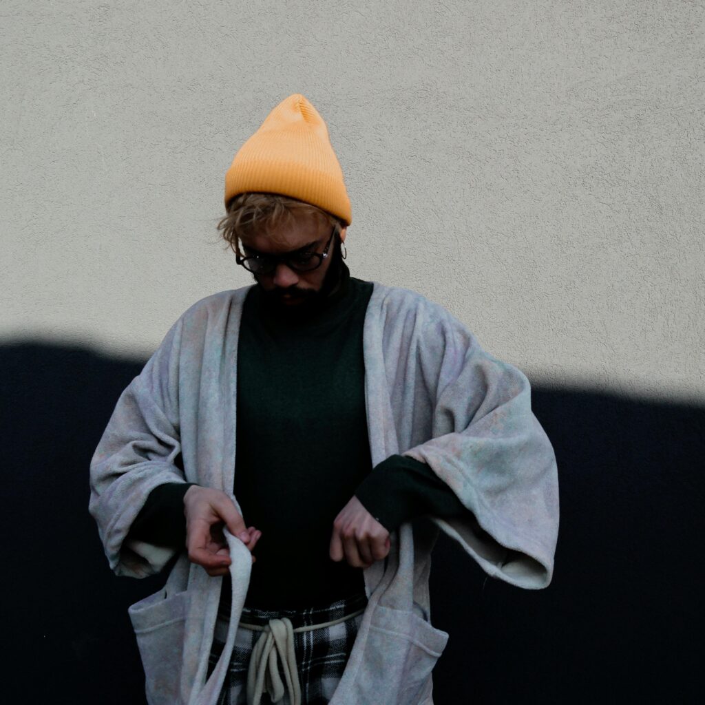 Budget Fashion to look stylish A man wearing oversized baggy clothes representing the most common budget style mistake that makes cheap clothes look worse