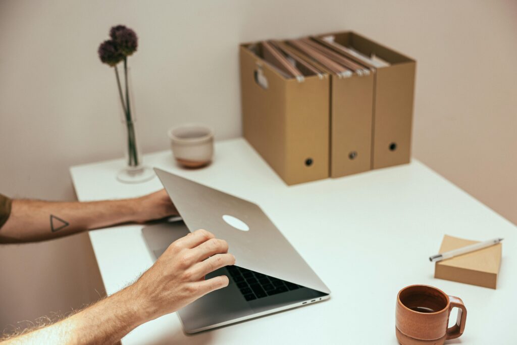 Calm workspace showing a closed laptop symbolizing healthy work boundaries.