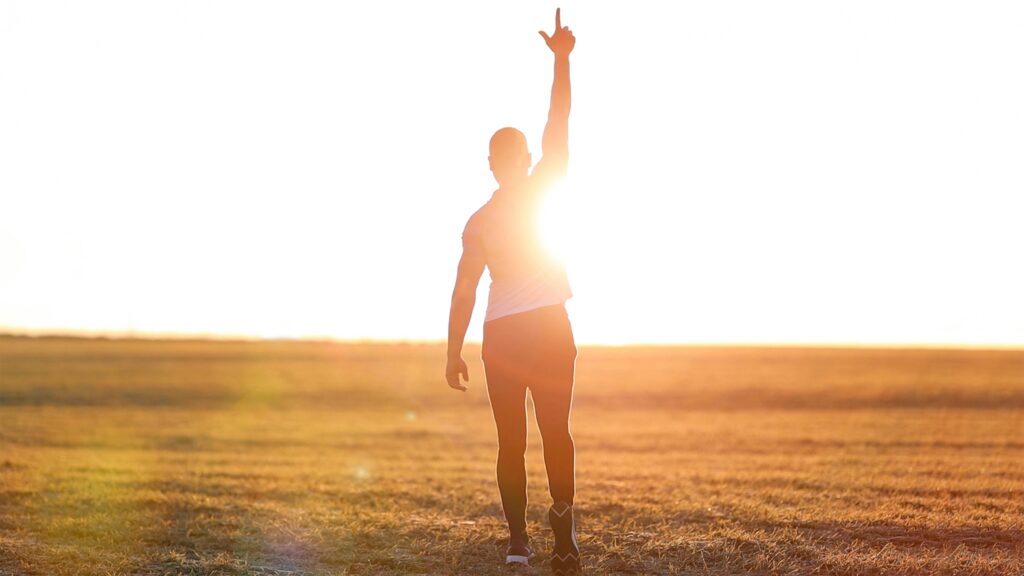 Man looking energised and renewed after recovering from burnout representing the return of confidence clarity and purpose