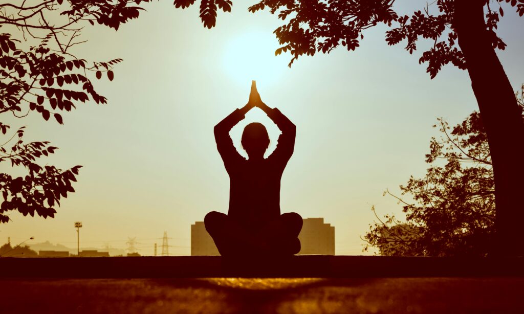Meditate daily Guy meditating early in the morning