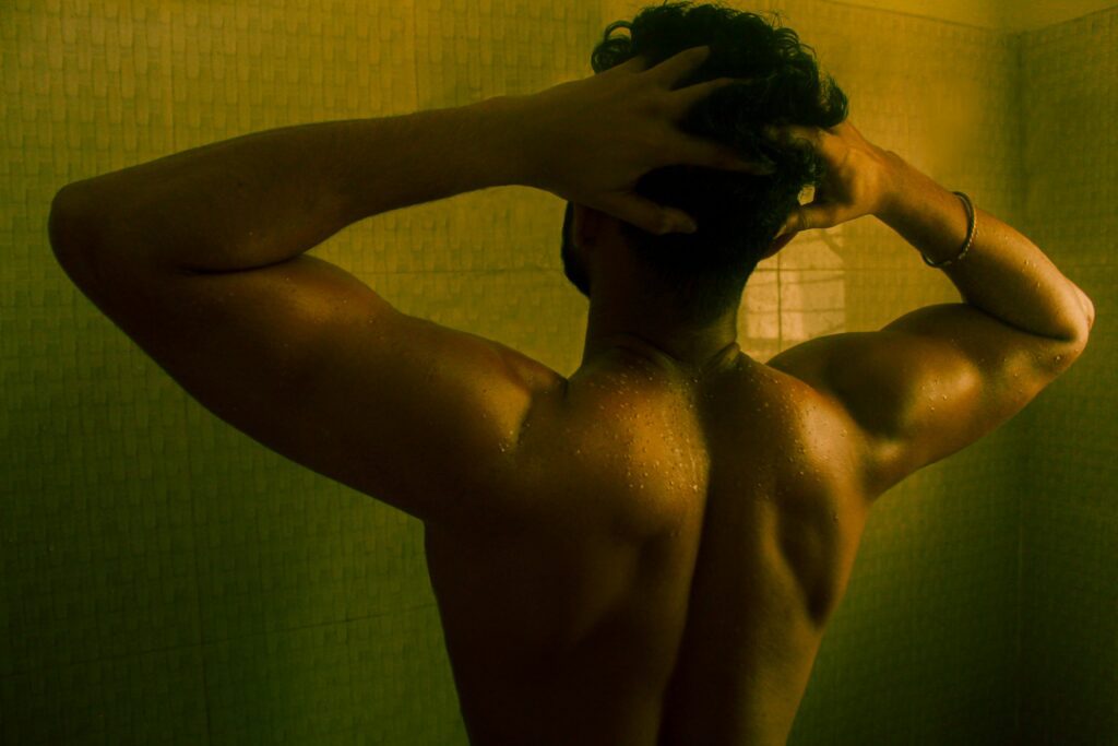 Cold Showers Guy taking cold shower to start the day